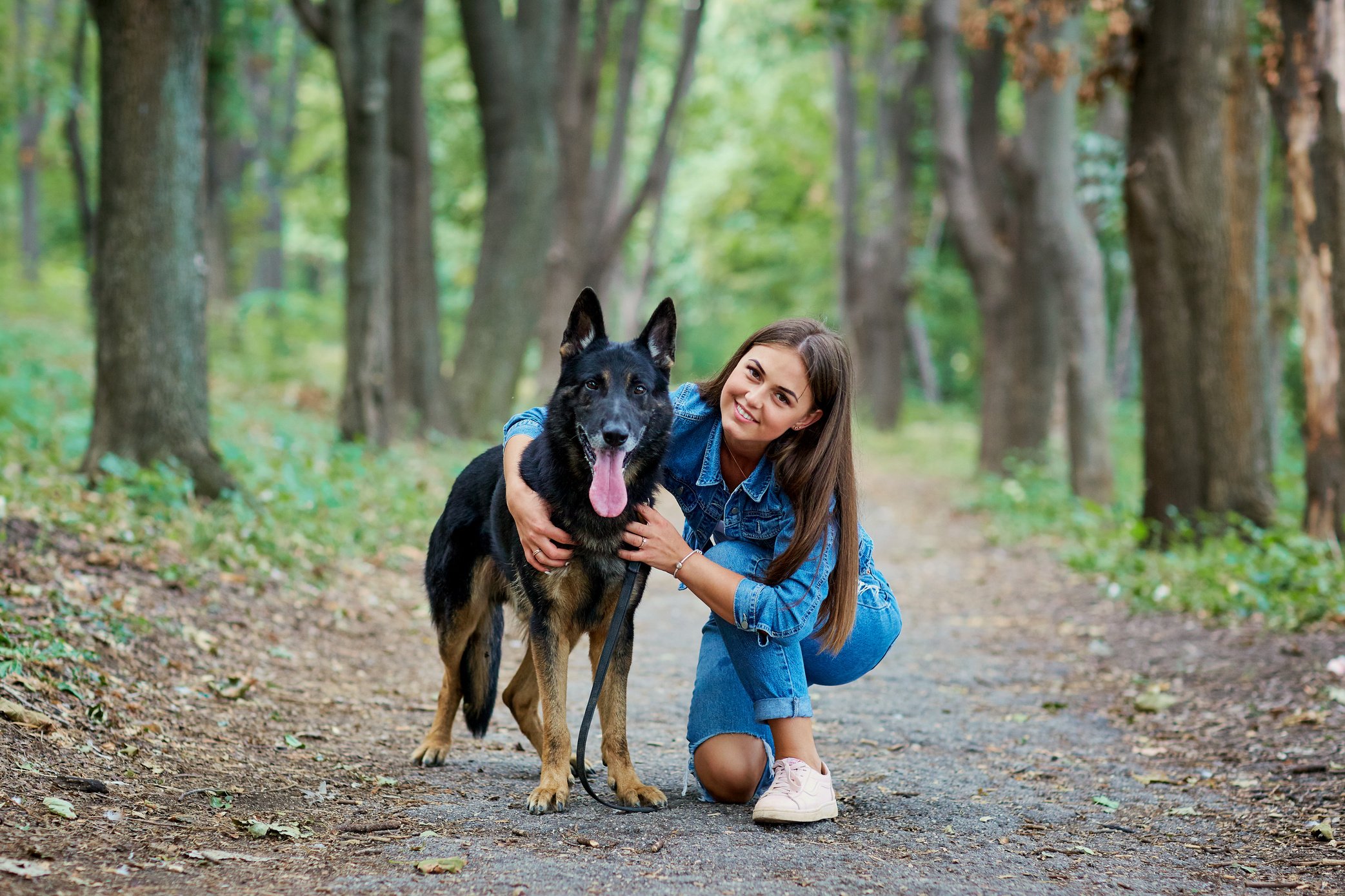 Girl with a Dog German Shepherd